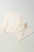 Women wearing a relaxed-fit cream and pale yellow checkered long sleeve lounge set