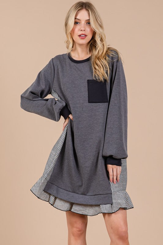 Striped patchwork knit sweatshirt dress in charcoal grey, black, and white