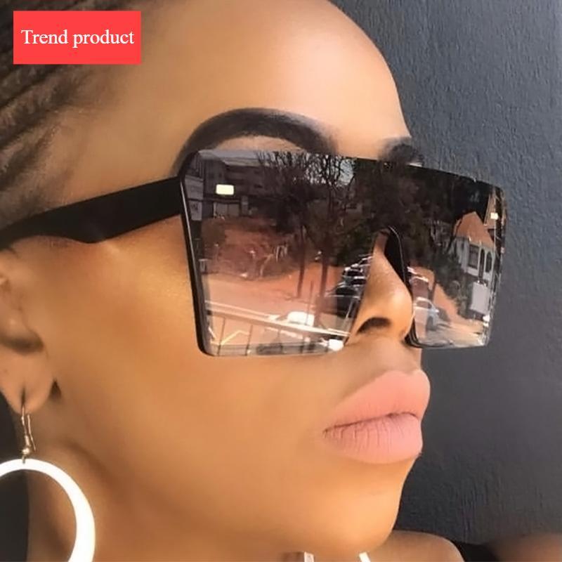Modern oversized square sunglasses with gradient lenses and flat-top retro frame.