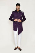 A stylish purple Indo-Western top with thread work paired with white straight-fit pants.