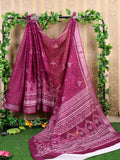 Elegant magenta cotton saree with matching blouse piece draped beautifully