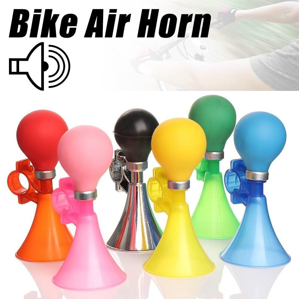 Stevvex children's bicycle air horn bell mounted on a child's bike handlebar