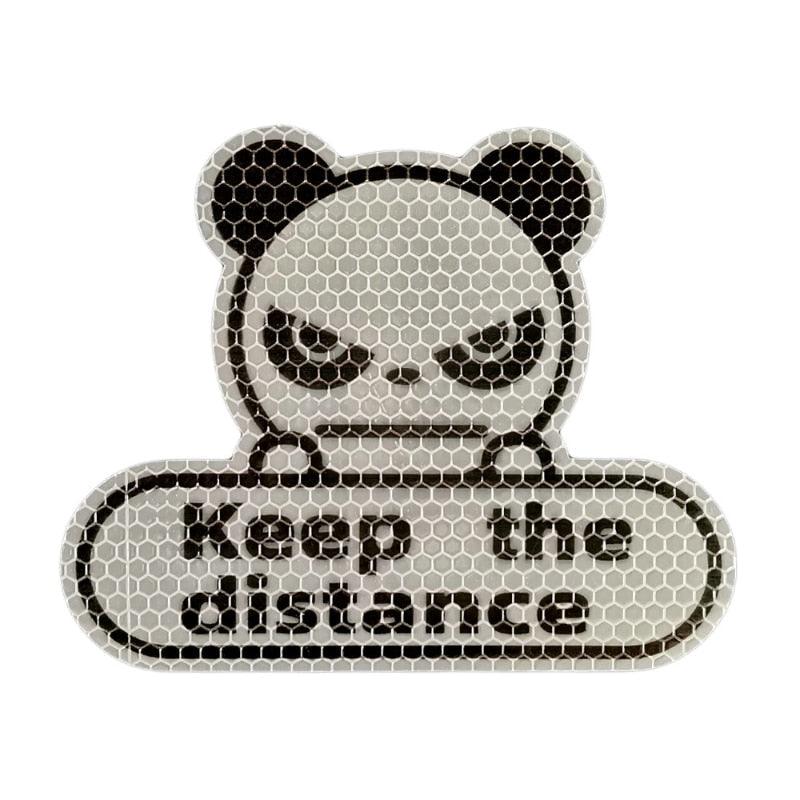 Fluorescent yellow-green honeycomb reflective panda safety sticker for cars and equipment.