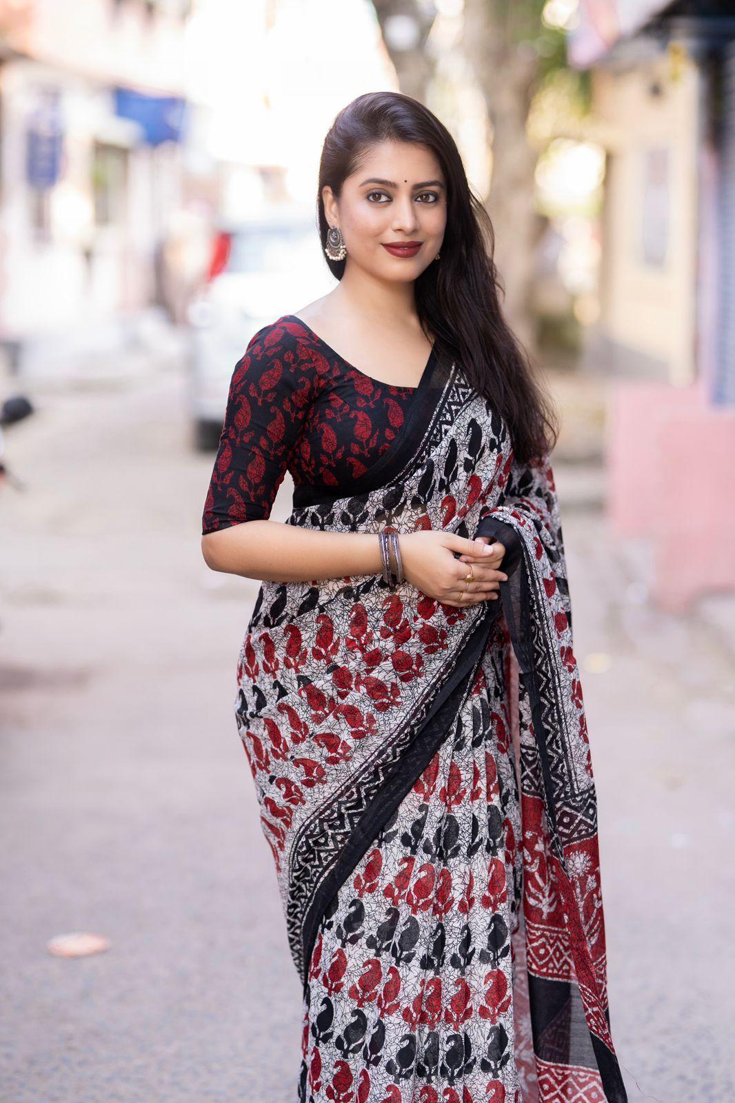 Grey Linen Blend Saree with Ethnic Motifs and Unstitched Blouse