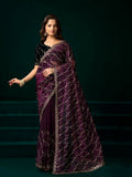 Wine colored net party wear saree with a black velvet blouse