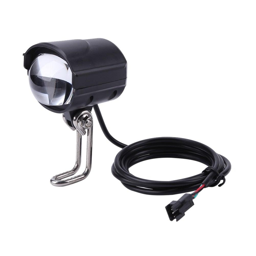 2-in-1 waterproof LED electric bike front light with integrated horn mounted on handlebars