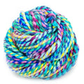 Close-up of vibrant multicolored recycled silk worsted weight yarn in shades of green, blue, pink, and turquoise.