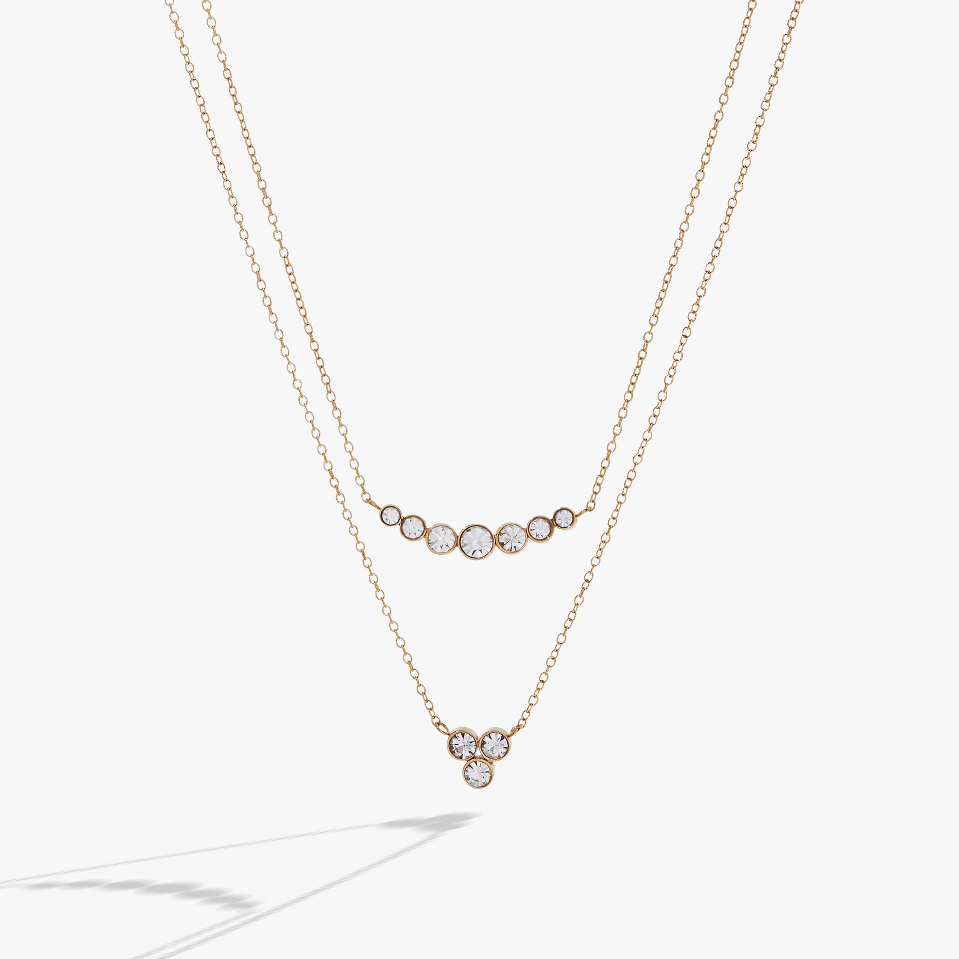 Double-layer crystal necklace with graduated stone sizes and adjustable clasp.