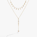 Two-layered necklace featuring princess-cut crystal charms on textured chains.