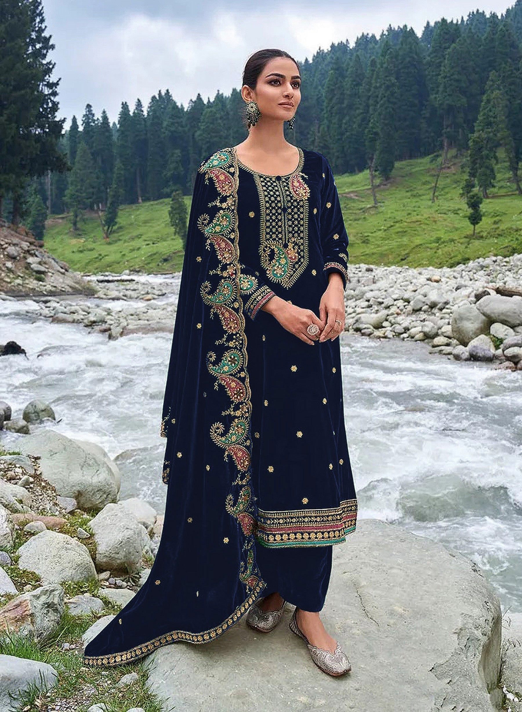 Royal blue velvet fabric featuring elegant embroidery and sequence work for salwar suits