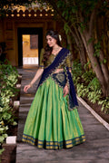 Seagreen and navy-blue Kanchipuram silk lehenga with gold Zari weaving