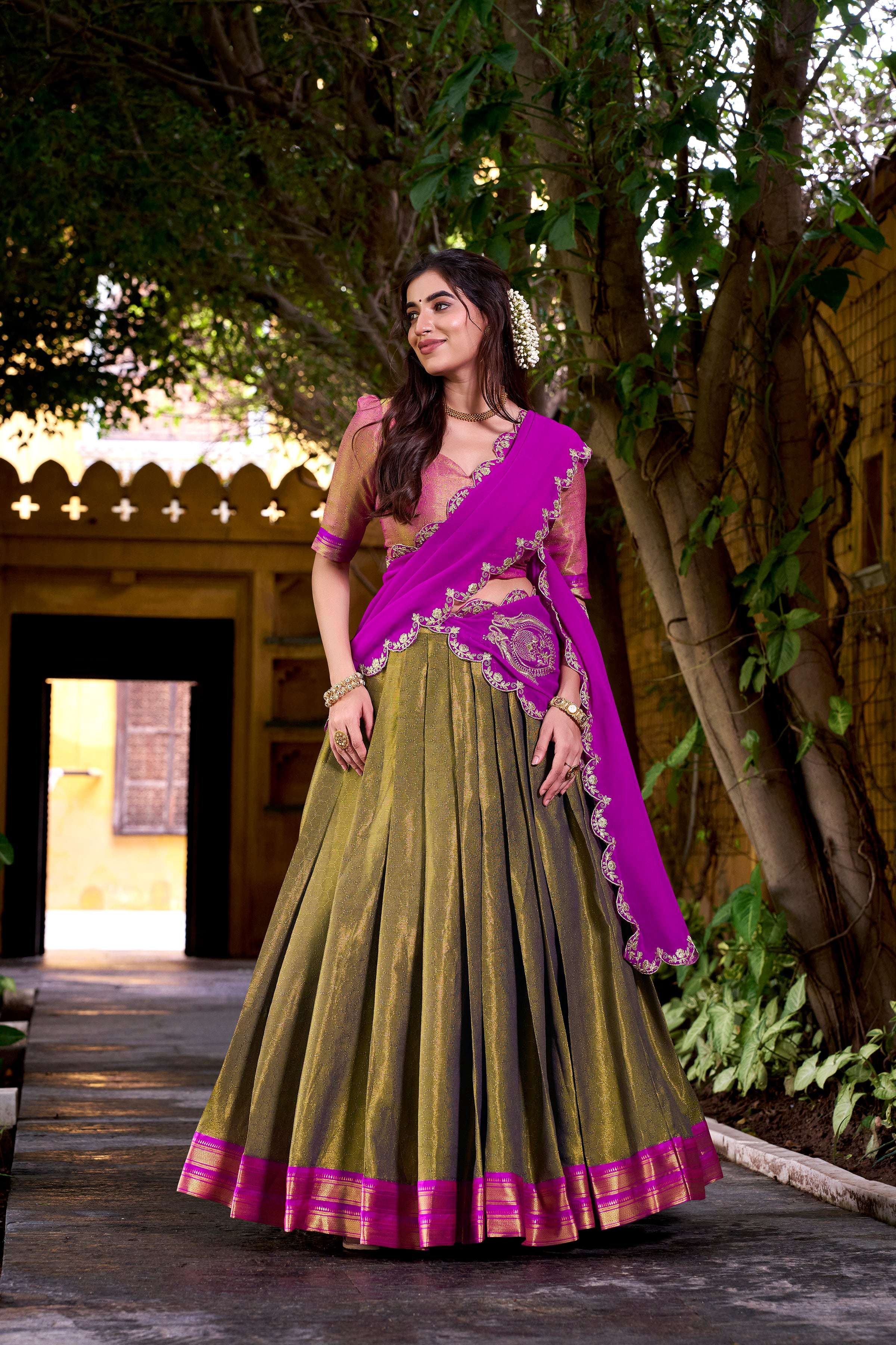 Olive green and magenta Kanchipuram silk lehenga choli with gold Zari weaving work and dupatta
