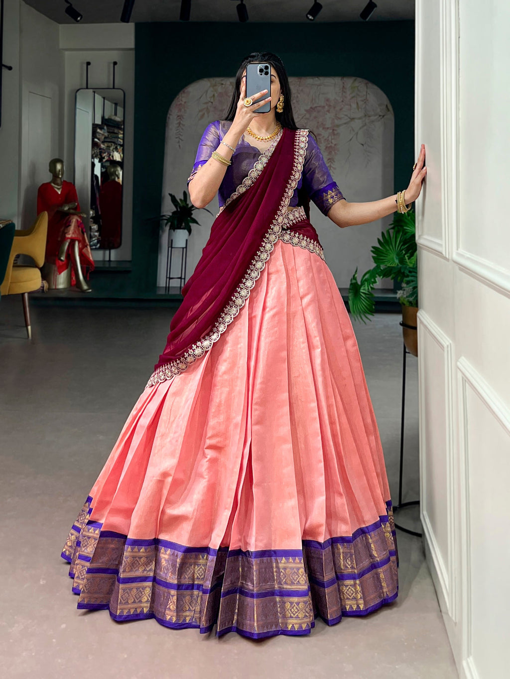 Peach Kanchipuram lehenga choli with intricate gold zari weaving work