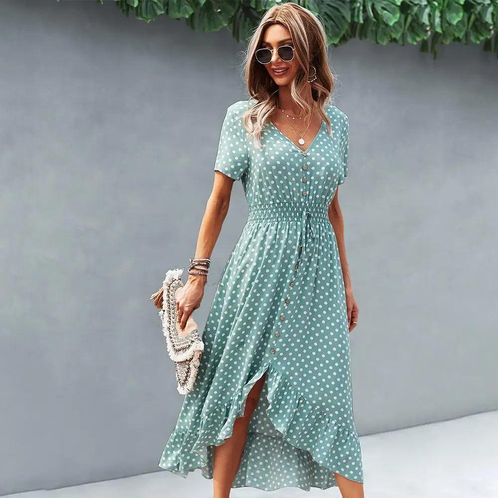 A woman wearing a bohemian vintage-style polka dot short sleeve midi dress