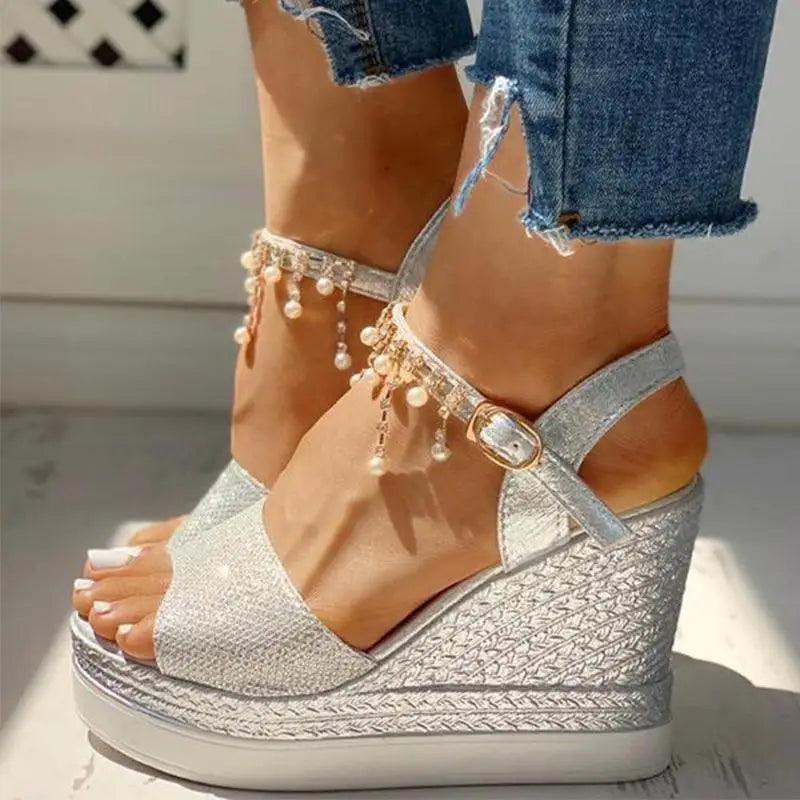 Close up of glamorous silver studded summer sandals for women