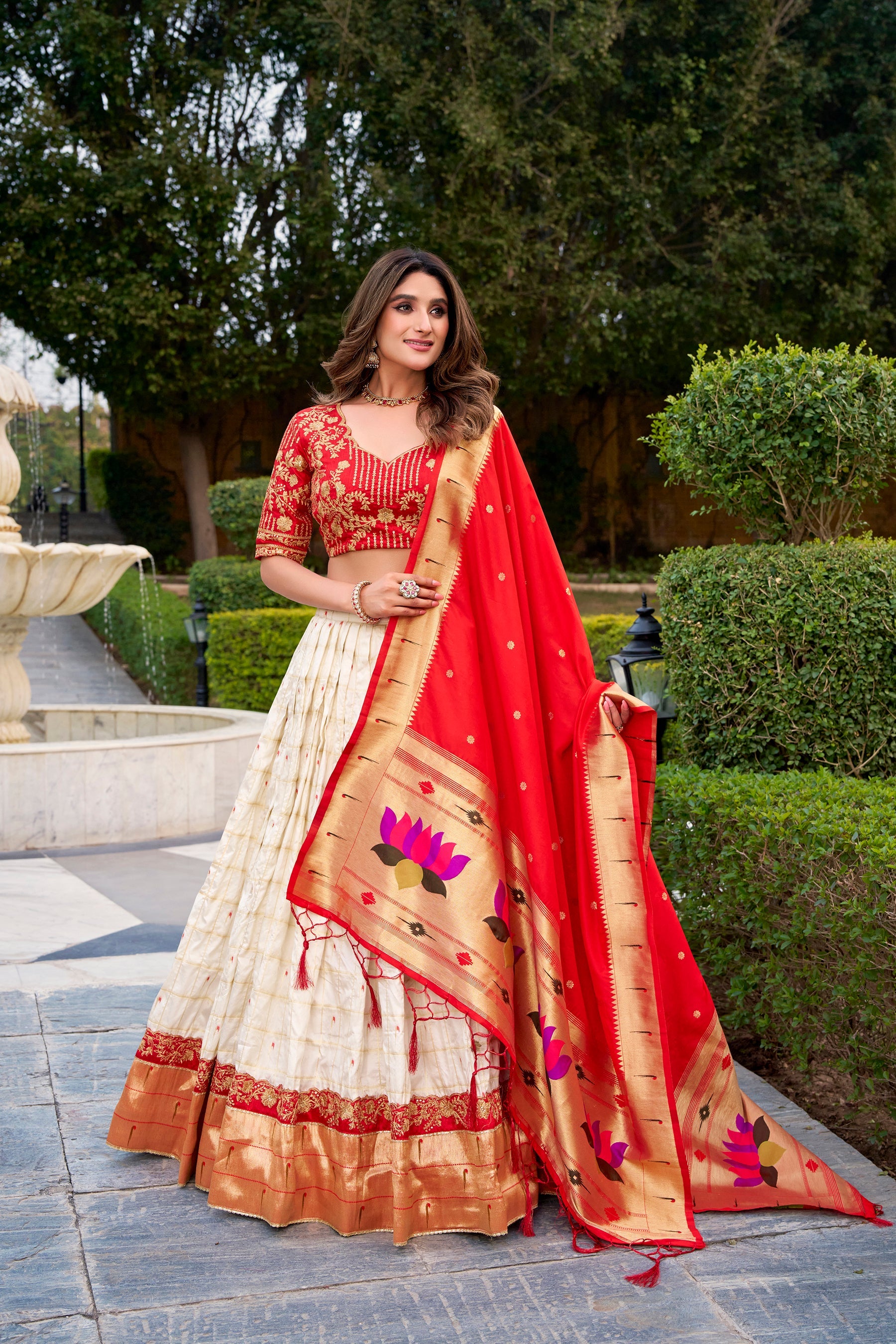 White Silk Paithani lehenga choli with zari weaving and sequin embroidery