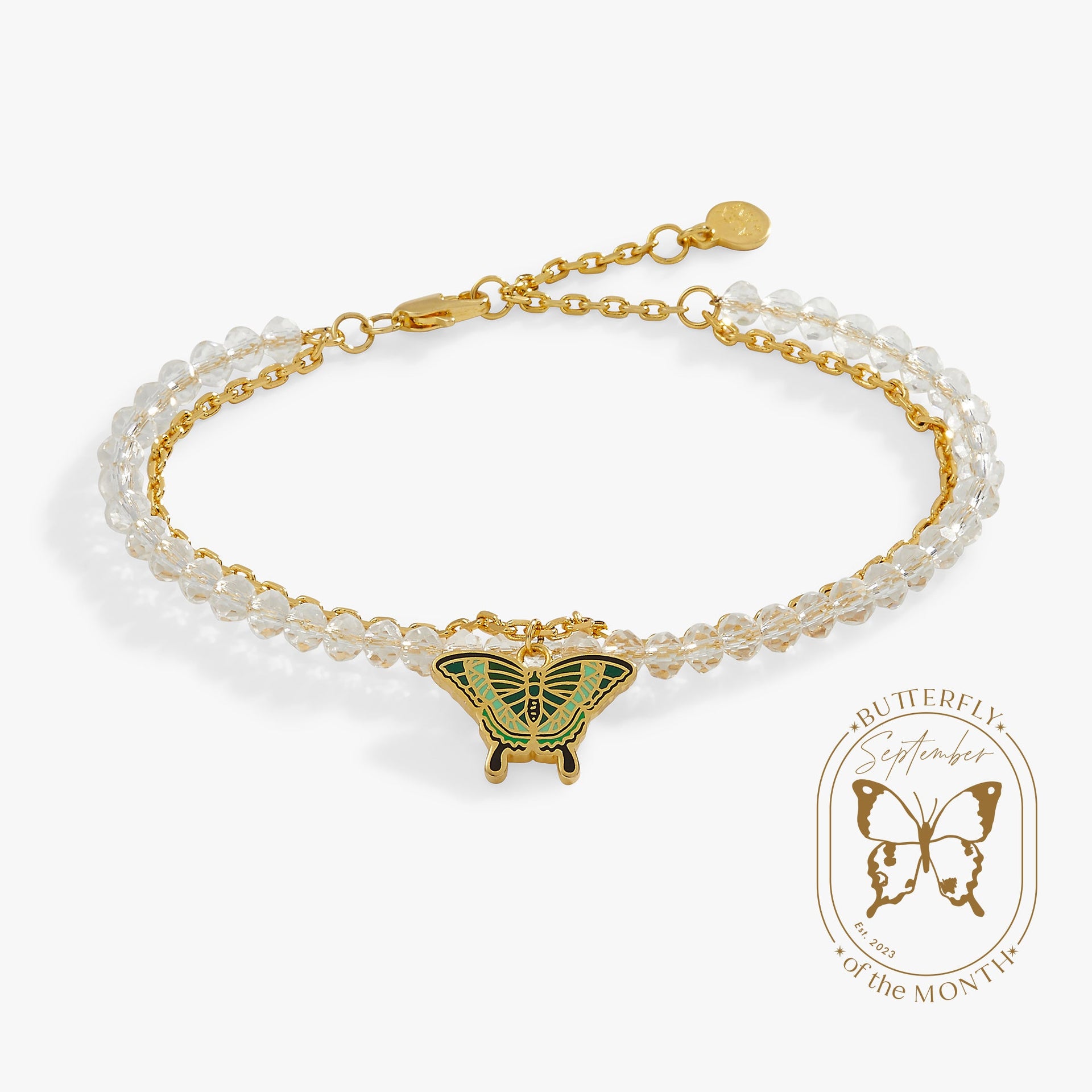 Emerald Swallowtail Butterfly charm bracelet with faceted clear glass beads and gold chain