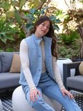 Malia Denim Terry Puffer Vest in a soft fabric with snap buttons and front pockets.