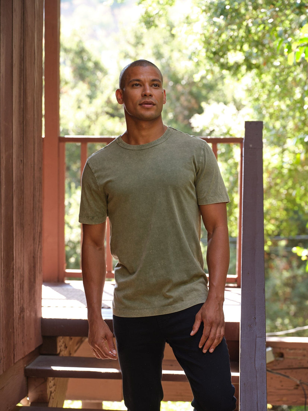 Close up of the Shawn Mineral Wash Eco Cotton Jersey Crew Tee in olive green, showing the mineral wash texture.