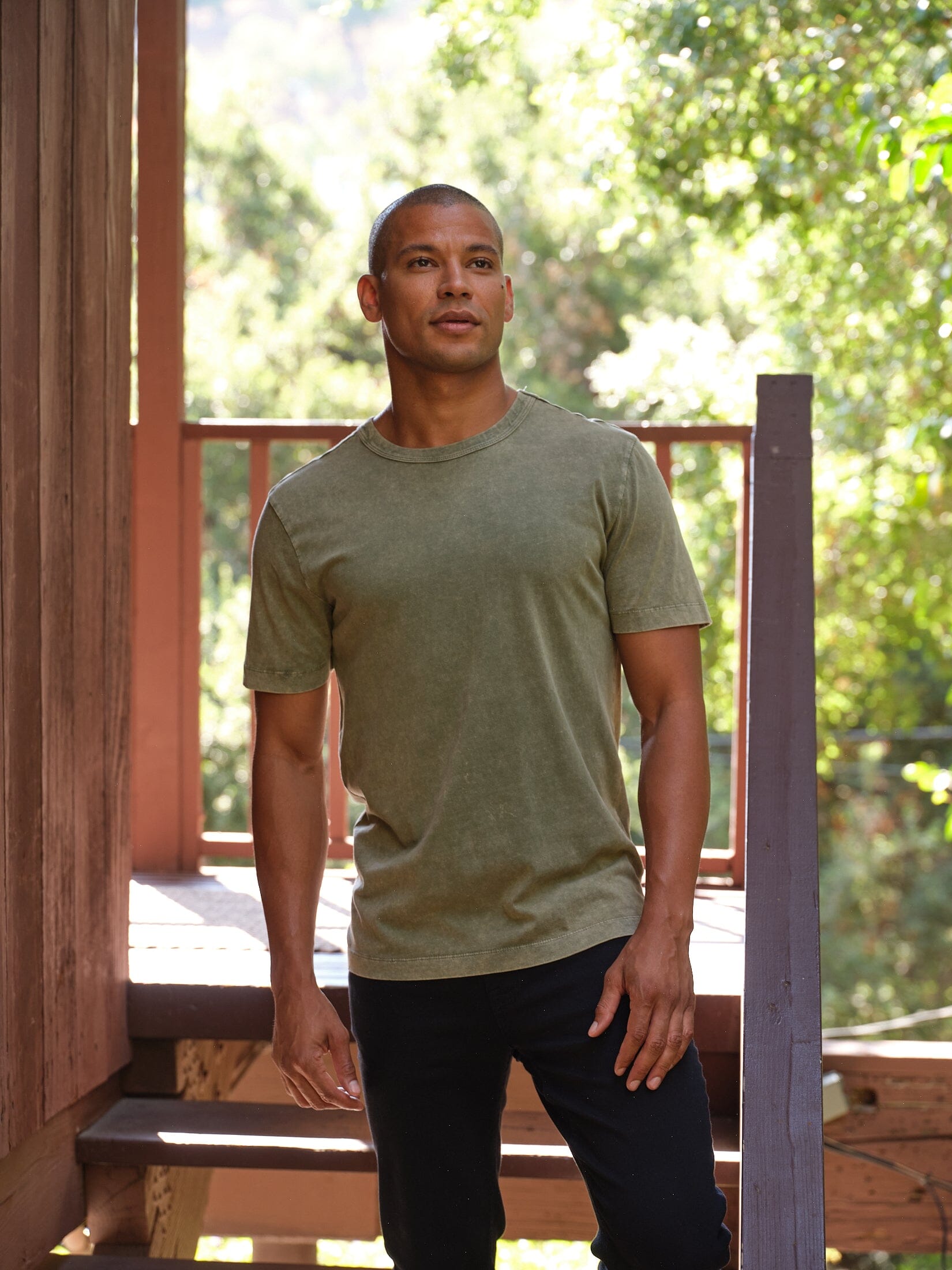 Close up of the Shawn Mineral Wash Eco Cotton Jersey Crew Tee in olive green, showing the mineral wash texture.