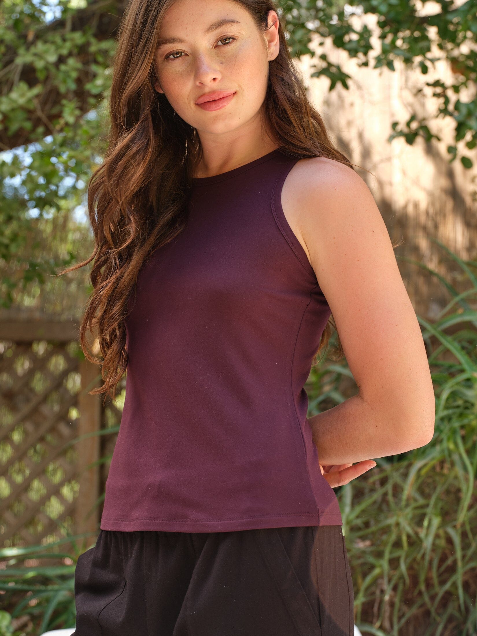 Dark-plum high-neck tank top made from premium Luxe Jersey fabric.