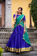 A beautiful Royalblue poly cotton lehenga choli with intricate gold Zari weaving work and a 3.5-meter flair.