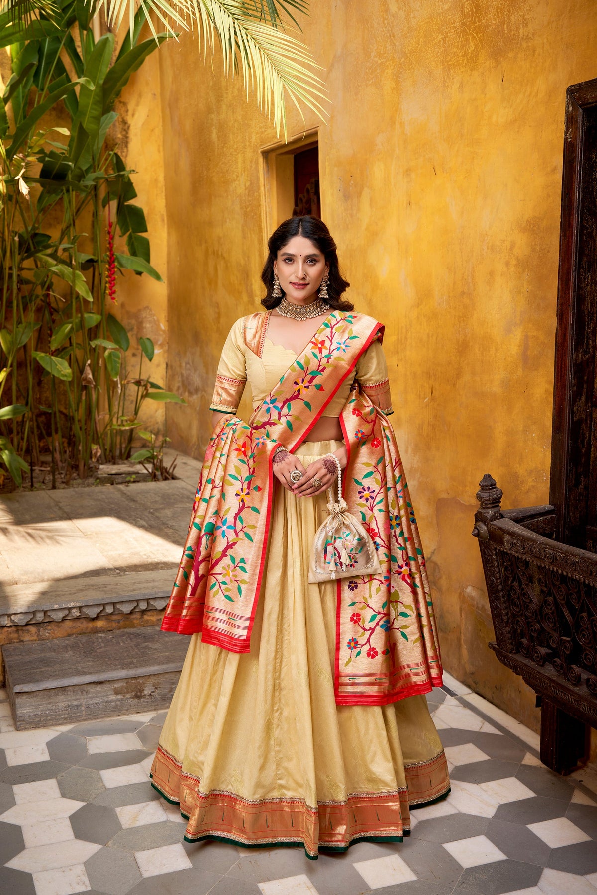 Cream Silk Paithani lehenga choli with zari weaving and lace border