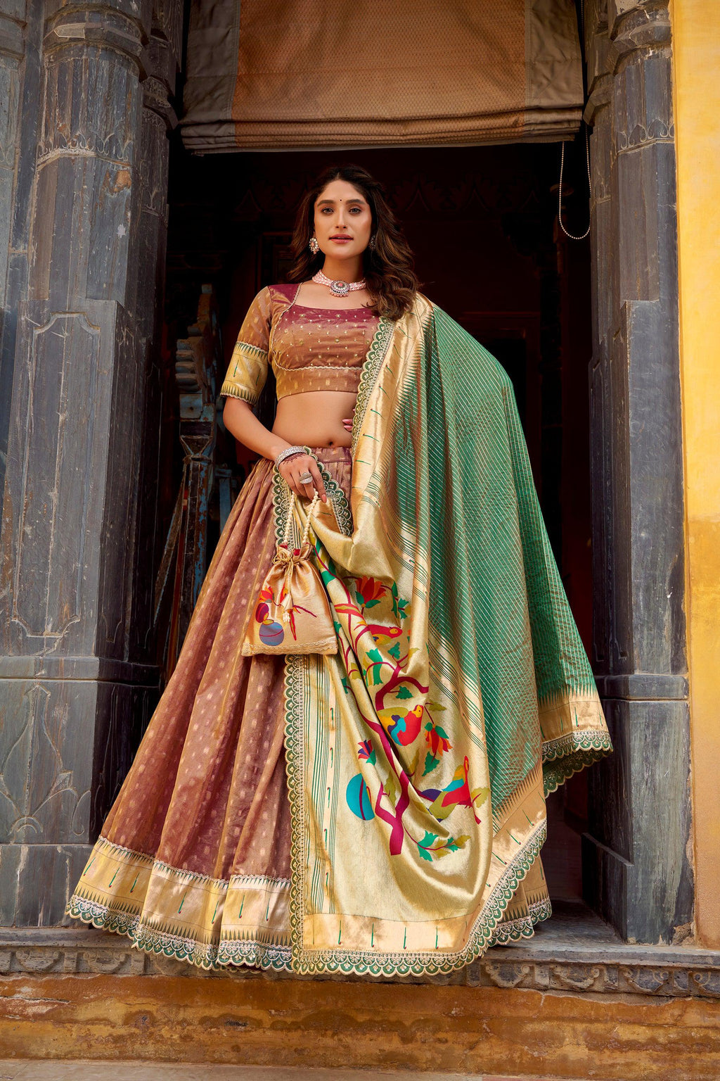 Brown Simmer Organza lehenga with intricate Zari weaving and lace border