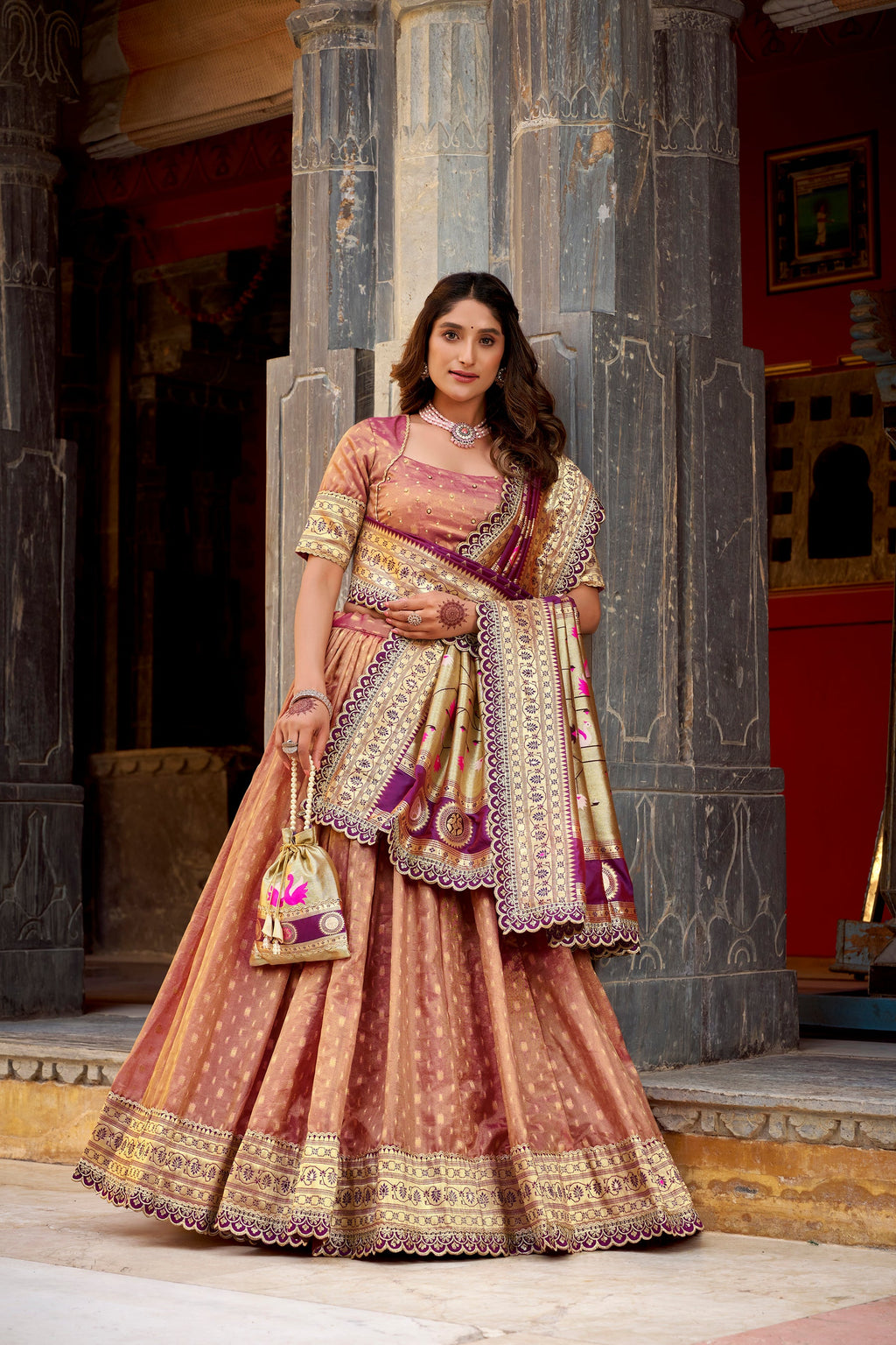 Peach Simmer Organza lehenga choli with Zari weaving and lace border detail