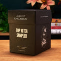 Top 10 Tea Sampler kit from August Uncommon Tea with ten sample bags and a scoop