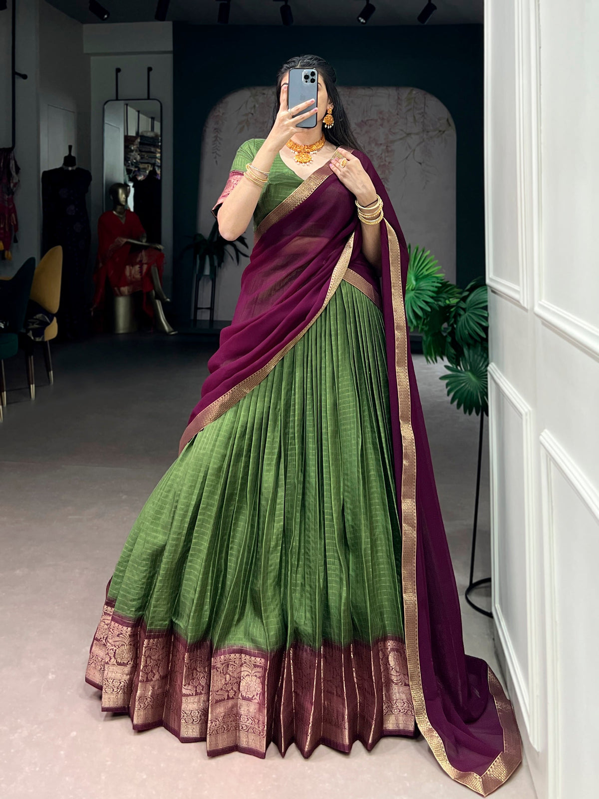 Mehendi colored Dola Chex lehenga choli featuring intricate zari weaving and chex pattern work