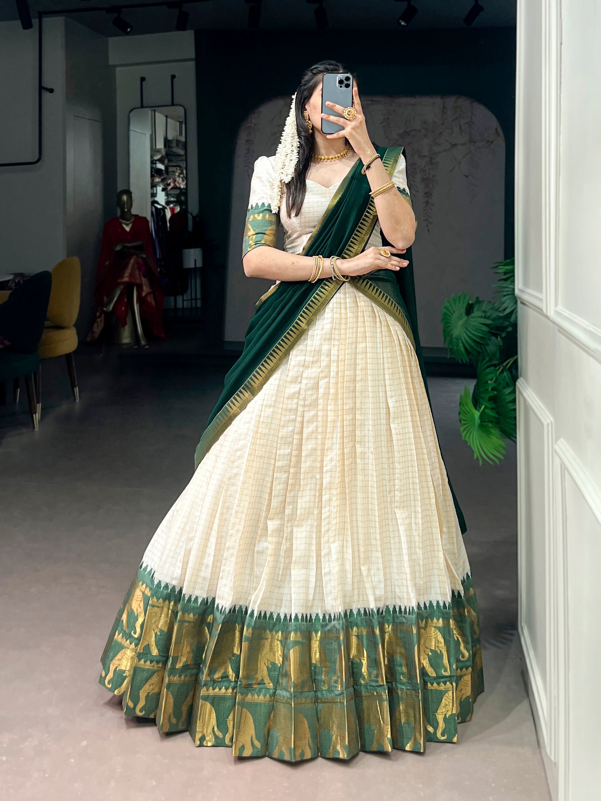White poly cotton lehenga choli with traditional chex pattern and gold Zari weaving.