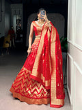 Red silk lehenga choli set with intricate zari weaving work and matching dupatta