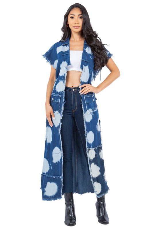 Women wearing a classic blue denim vest with button-down front design.