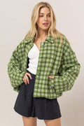 Green tweed plaid collared jacket with a button-up front.
