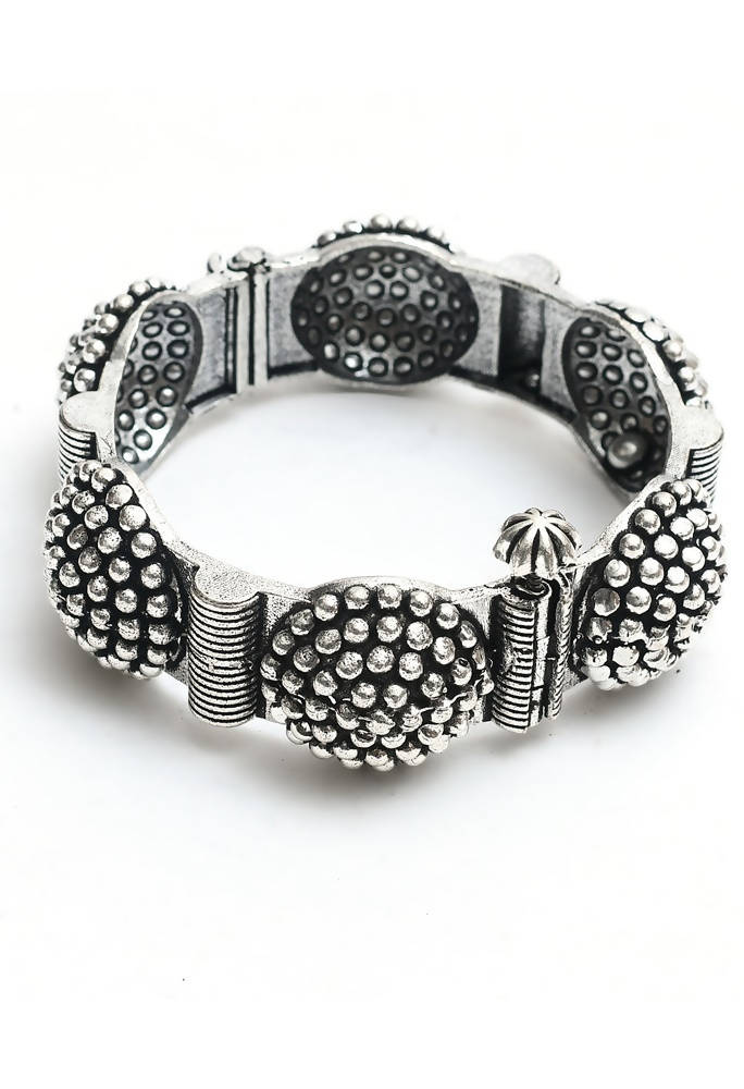 Set of oxidised German silver bangles featuring traditional intricate patterns