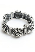 Set of oxidised German silver bangles featuring traditional intricate patterns
