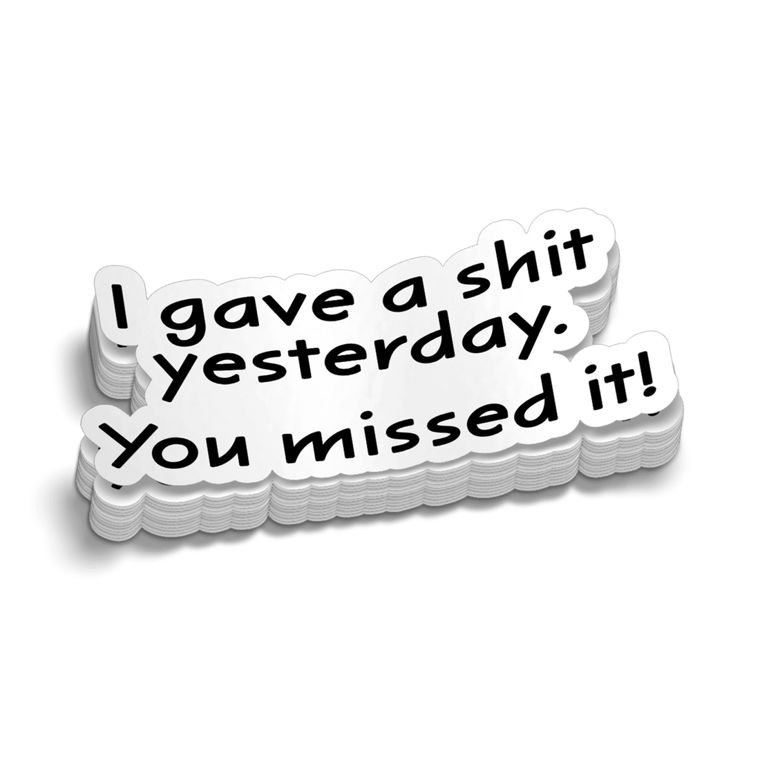 A stack of white vinyl stickers with black text reading I gave a shit yesterday. You missed it!