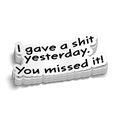 A stack of white vinyl stickers with black text reading I gave a shit yesterday. You missed it!