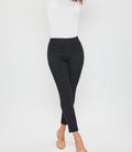 Petite high rise black jeggings with thick waistband and faux front pockets