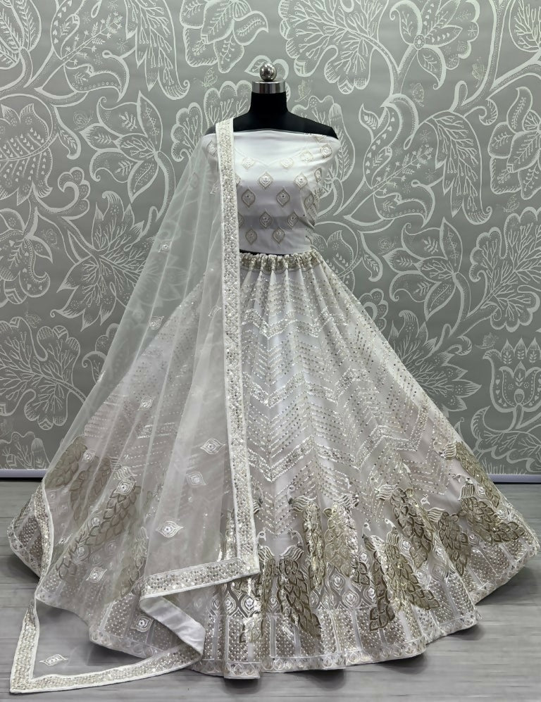 White bridal net lehenga choli with fancy foil and multi-thread embroidery