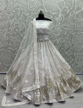 White bridal net lehenga choli with fancy foil and multi-thread embroidery