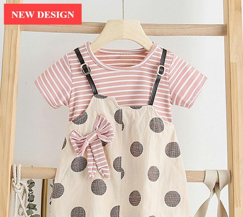 Baby girl wearing a floral ruffle sleeve tutu dress with a matching sun hat