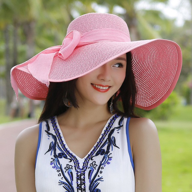 Women’s Wide Brim Summer Straw Hat with Elegant Bowknot Detail