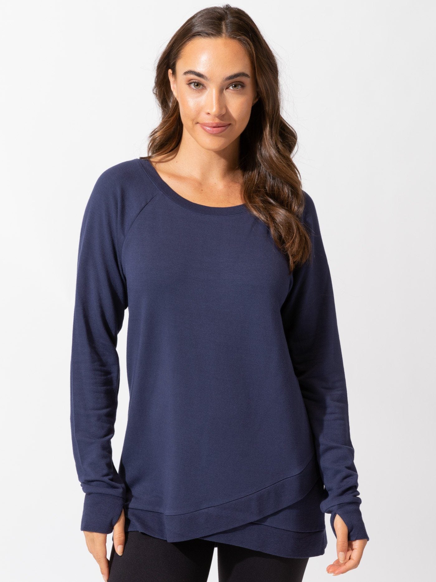 Leanna Feather Fleece Tunic in solid deep navy blue with long sleeves, crew neckline, and tulip hem.