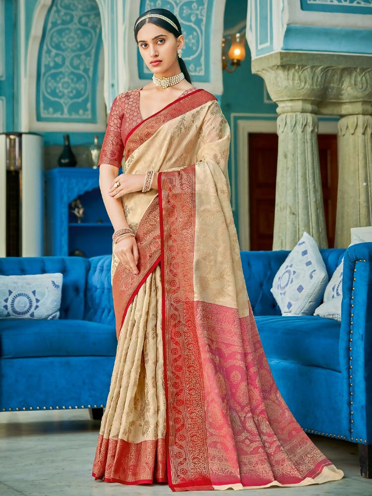 Sophisticated cream linen cotton saree with a contrast red blouse
