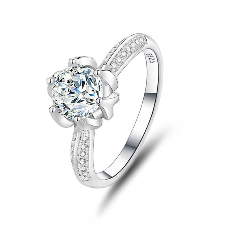 Anemone flower design ring in S925 sterling silver with a central moissanite stone