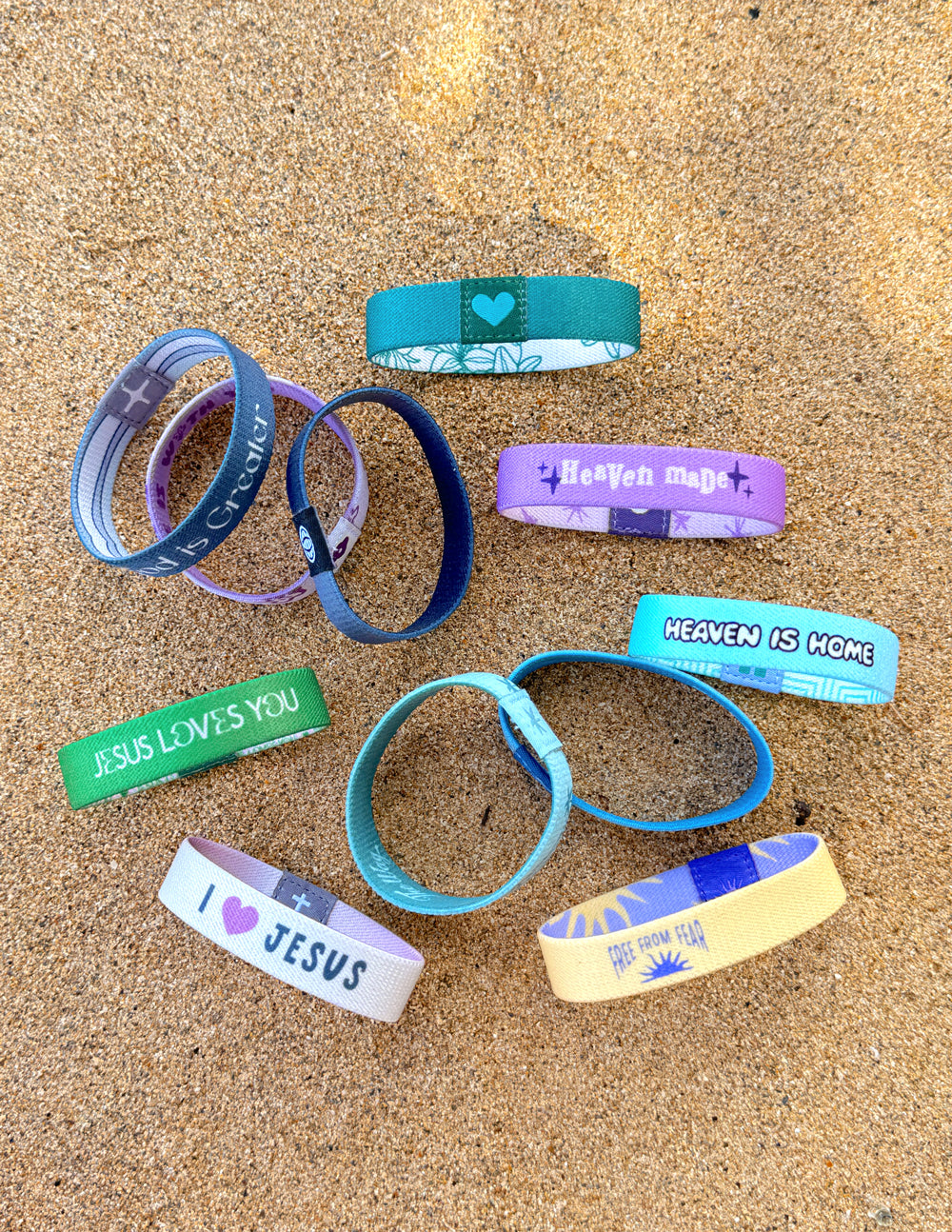A colorful assortment of knit wristbands from the Elevated Faith mystery 50-pack