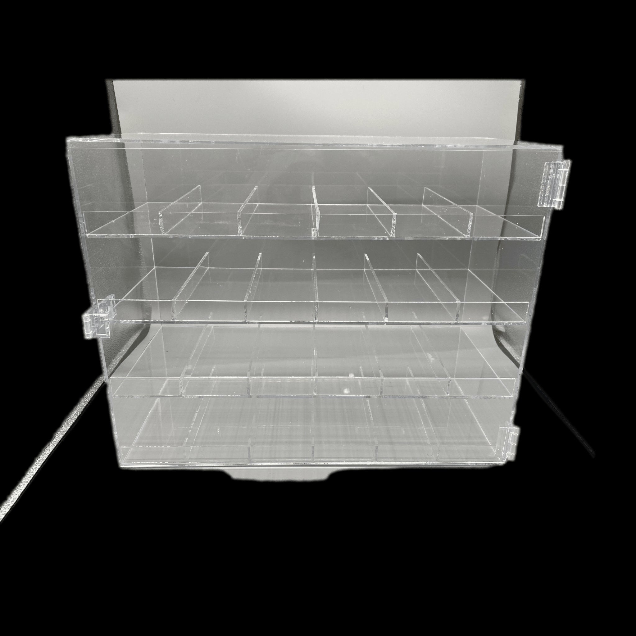 A clear 24-slot acrylic jewelry display case sitting on a clean surface, showcasing organized jewelry.