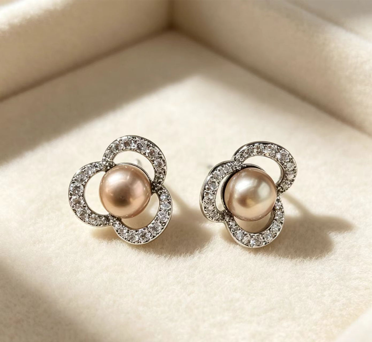 Hollow Four-Leaf Clover Diamond-Encrusted Champagne Pearl Womens Earrings